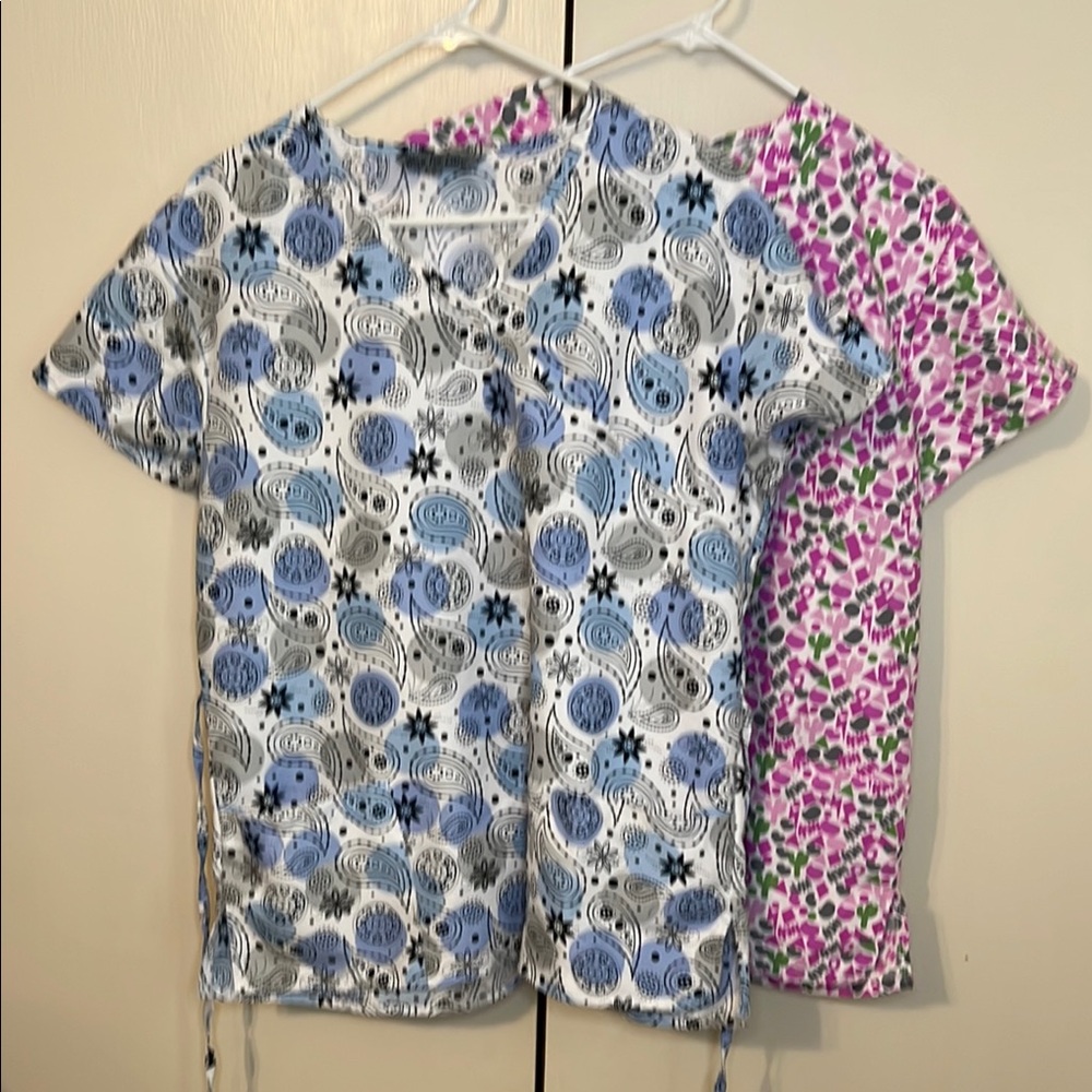Lot of two scrub tops by Wear for Care size medium